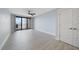 Spacious bedroom with water view and double doors at 50 Coe Rd # 125, Belleair, FL 33756
