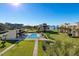 Community pool and surrounding grounds with waterfront access at 50 Coe Rd # 125, Belleair, FL 33756
