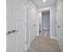 Walkthrough bathroom with double vanity and patterned tile floor at 50 Coe Rd # 125, Belleair, FL 33756