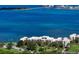 Waterfront condo building with stunning bay views and lush landscaping at 50 Coe Rd # 125, Belleair, FL 33756