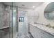 Spa-like bathroom with marble and patterned floors at 50 Coe Rd # 125, Belleair, FL 33756