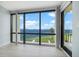 Bedroom with amazing water view and balcony access at 50 Coe Rd # 125, Belleair, FL 33756