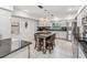 Updated kitchen with granite countertops and stainless steel appliances at 3047 Enisglen Dr, Palm Harbor, FL 34683