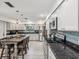 Modern kitchen featuring stainless steel appliances and granite countertops at 3047 Enisglen Dr, Palm Harbor, FL 34683