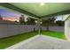 Covered back patio with access to fenced backyard at 105 Dartmouth Rd, Venice, FL 34293