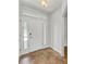 Bright and airy entryway with tile flooring at 105 Dartmouth Rd, Venice, FL 34293