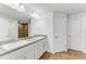 Double vanity bathroom with granite countertop and tile floor at 105 Dartmouth Rd, Venice, FL 34293