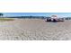 Relaxing beach scene with people enjoying the sun at 105 Dartmouth Rd, Venice, FL 34293