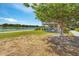 Relaxing gazebo by the lake with picnic tables at 105 Dartmouth Rd, Venice, FL 34293