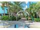 Entrance to Venice Fishing Pier, featuring lush landscaping at 105 Dartmouth Rd, Venice, FL 34293