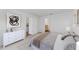 Main bedroom with carpeted floor and en-suite bathroom at 105 Dartmouth Rd, Venice, FL 34293