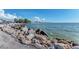 Stunning ocean view with rocky shoreline and calm waters at 105 Dartmouth Rd, Venice, FL 34293