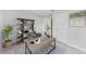 Home office featuring built-in shelving and a workspace at 105 Dartmouth Rd, Venice, FL 34293