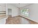 Bright dining area with tile flooring and a view to the backyard at 105 Dartmouth Rd, Venice, FL 34293