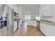 Modern kitchen with stainless steel appliances and granite countertops at 105 Dartmouth Rd, Venice, FL 34293