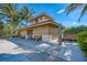 Beachfront restrooms with benches under palm trees at 105 Dartmouth Rd, Venice, FL 34293