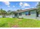 House exterior with a large backyard and lawn at 105 Dartmouth Rd, Venice, FL 34293