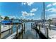 Tranquil marina with docked boats and wooden walkways at 105 Dartmouth Rd, Venice, FL 34293