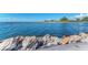 Serene ocean view with rocky shoreline and blue waters at 105 Dartmouth Rd, Venice, FL 34293