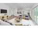 Open concept living room, dining, and kitchen area at 105 Dartmouth Rd, Venice, FL 34293