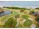 Aerial view of golf course community with waterfront access at 2620 Cove Cay Dr # 107, Clearwater, FL 33760