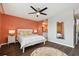 Main bedroom with a queen bed and large mirror at 2620 Cove Cay Dr # 107, Clearwater, FL 33760