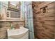 Updated bathroom with walk-in shower at 6220 5Th S Ave, St Petersburg, FL 33707