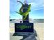 Welcome to Gulfport, Florida sign with a unique lizard sculpture at 6220 5Th S Ave, St Petersburg, FL 33707