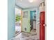 Laundry room with stackable washer/dryer and mini fridge at 6220 5Th S Ave, St Petersburg, FL 33707