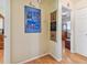 Bright hallway with access to bedrooms and featuring artwork at 6220 5Th S Ave, St Petersburg, FL 33707
