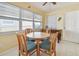 Small dining room with a round table and four chairs at 6220 5Th S Ave, St Petersburg, FL 33707