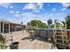 Wooden deck area with above ground pool and outdoor seating at 6220 5Th S Ave, St Petersburg, FL 33707
