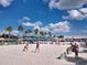 Beach volleyball game in progress on a sunny day at 6220 5Th S Ave, St Petersburg, FL 33707