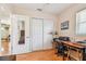 Bright home office features built-in closet and desk area at 6220 5Th S Ave, St Petersburg, FL 33707
