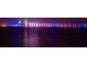 Night view of a long bridge with colorful lights reflecting on the water at 6220 5Th S Ave, St Petersburg, FL 33707