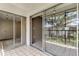 Sliding glass doors lead to a private patio at 106 Pine Ct # 106, Oldsmar, FL 34677