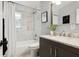 Updated bathroom with marble tile and vanity at 1058 60Th N Ave, St Petersburg, FL 33703