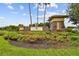 Stone Key Vista entrance sign with landscaping and palm trees at 2711 Coldstone Ln, Holiday, FL 34691