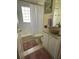 Bathroom with a vessel sink and updated fixtures at 24327 Buckingham Way, Punta Gorda, FL 33980