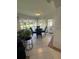 Bright dining room with table and chairs near canal view at 24327 Buckingham Way, Punta Gorda, FL 33980