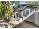 View of the back of the house and small backyard at 907 E North Bay St, Tampa, FL 33603