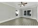 Spacious bedroom with hardwood floors and large windows at 907 E North Bay St, Tampa, FL 33603