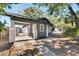 Charming bungalow with gray siding and a covered porch at 907 E North Bay St, Tampa, FL 33603