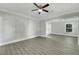 Open living area with hardwood floors and fireplace at 907 E North Bay St, Tampa, FL 33603