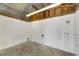 Unfinished workshop interior with exposed beams and plumbing at 907 E North Bay St, Tampa, FL 33603