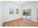 Bright dining room with sliding glass doors leading to a patio at 10110 Bay State Dr, Port Charlotte, FL 33981