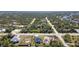 A picturesque aerial view captures the layout of the community, blending residential and natural elements at 14346 San Domingo Blvd, Port Charlotte, FL 33981