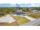 Birds-eye view of attractive modern home with manicured lawn near community, showcasing neighborhood at 14346 San Domingo Blvd, Port Charlotte, FL 33981