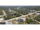 Overhead view of neighborhood near canals, roads, and natural landscape at 14346 San Domingo Blvd, Port Charlotte, FL 33981