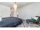 Main bedroom features hardwood floors and a lounge chair at 14346 San Domingo Blvd, Port Charlotte, FL 33981